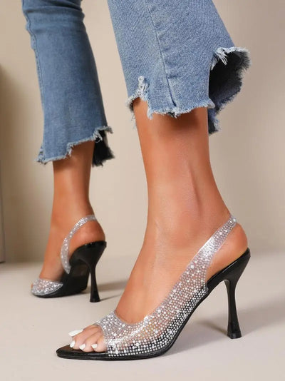 Sandalia de tacón transparente con strass y correa trasera