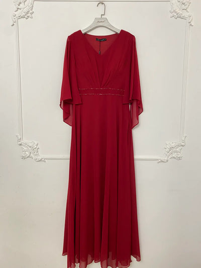 Vestido con mangas y pedreria en V